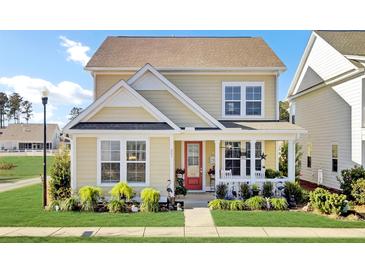 Charming 2-story house with a welcoming front porch and landscaped yard at 203 Oak View Way, Summerville, SC 29483