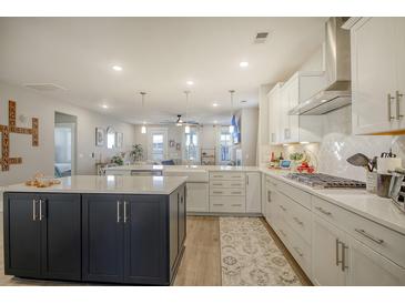 Spacious kitchen featuring an island, stainless steel appliances, and ample cabinetry at 128 Sandy Bend Ln, Summerville, SC 29486