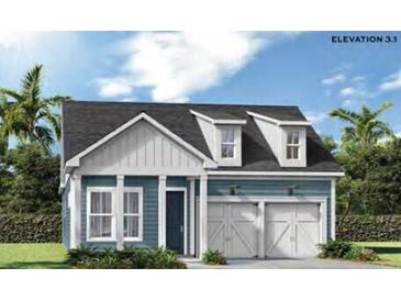 Two-story craftsman style home with blue siding, white accents, and a two-car garage at 374 Trailmore Ln, Summerville, SC 29486