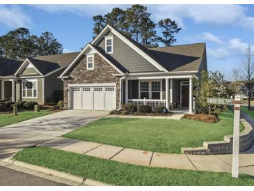 Craftsman style home with stone accents and a 3-car garage at 3002 Cross Vine Ln, Summerville, SC 29483