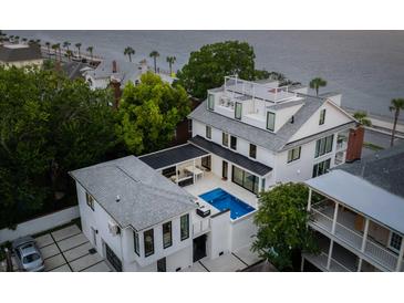 Luxury home with pool, and rooftop deck; waterfront property at 100 Murray Blvd, Charleston, SC 29401