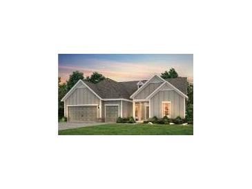 Two-story house with gray siding, two car garage, and landscaped lawn at 1180 Island Preserve Rd, Johns Island, SC 29455