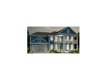 Two-story home with a wraparound porch and attached garage at 4326 Hugh Bennett Dr, Johns Island, SC 29455