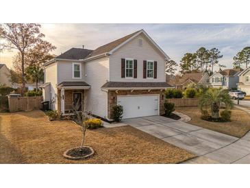 Two-story house with stone accents and a two-car garage at 1504 Oldenburg Dr, Mount Pleasant, SC 29466
