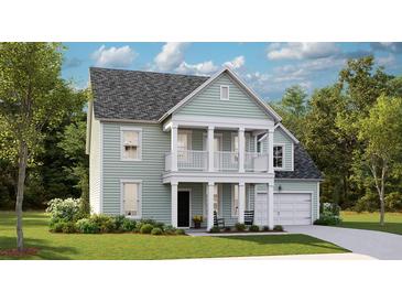 Two-story house with light green siding, balcony, and attached garage at 107 Pen Shell St, Summerville, SC 29485