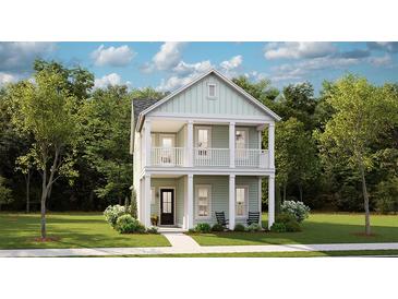 Two-story craftsman home with light green siding, front porch, and landscaping at 140 Maritime Way, Summerville, SC 29485