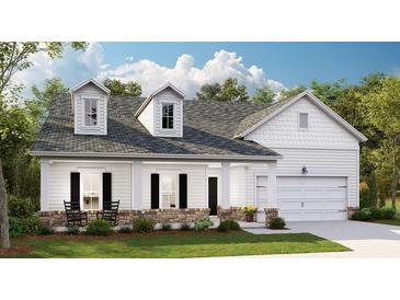 Two-story house with white siding, gray roof, stone accents, and a two-car garage at 563 Richfield Way, Summerville, SC 29486