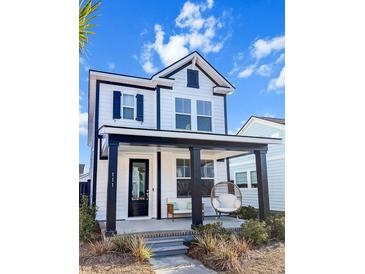 Charming two-story home with white siding, black accents, and a welcoming front porch at 111 Crimson St, Summerville, SC 29486