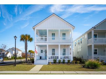 Two-story white house with front porch and landscaping at 1680 Banning St, Mount Pleasant, SC 29466
