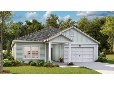 One-story house with light green siding, white garage door, and landscaping at 564 Richfield Way, Summerville, SC 29486