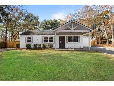 Newly renovated house with front yard and porch at 1558 Burnswick Dr, Johns Island, SC 29455