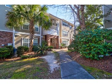 Attractive building exterior with landscaping and walkway at 188 Midland Pkwy # 205, Summerville, SC 29485