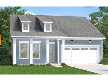 Charming single-story home featuring a welcoming facade, gray roof, and an attached two-car garage at 422 Evening Glow Ln, Summerville, SC 29486