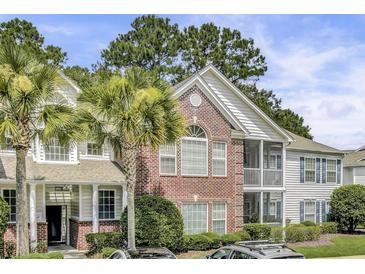 Charming multi-story condo with brick facade and manicured landscaping at 1652 Camfield Ln, Mount Pleasant, SC 29466