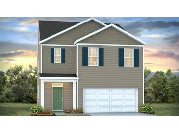 Charming two-story home with a two-car garage, covered entry, and neutral toned siding at 243 Watersglen Dr, Summerville, SC 29486