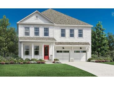 Charming two-story home with white siding, a red front door, and a two-car garage at 2004 Sea Water Dr, Charleston, SC 29412