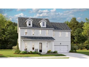 Charming two-story home with a covered front porch, dormer windows, and a well-manicured lawn at 233 Denham St, Summerville, SC 29486