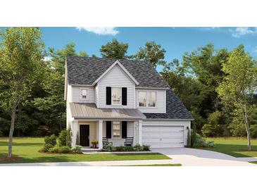 Charming two-story home featuring a covered porch, black shutters and a two-car garage at 131 Threaded Fern St, Summerville, SC 29485