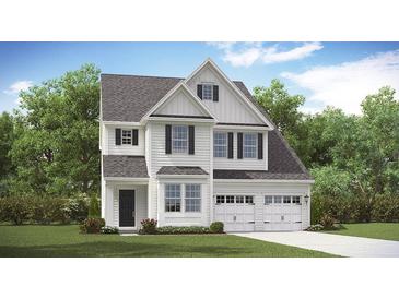 Charming two-story home with white siding, black shutters, and a manicured front lawn at 200 Pine Crest View Dr, Summerville, SC 29486