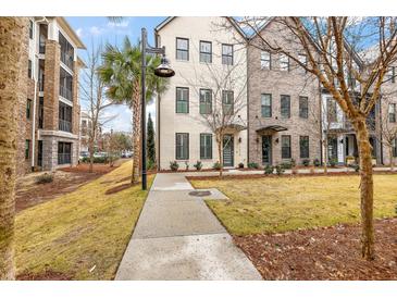 Charming townhomes with sidewalks, mature trees, and well-manicured lawns in a walkable neighborhood at 1510 Martel St, Mount Pleasant, SC 29464