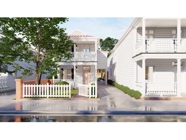 Charming two-story home with white picket fence and well-maintained landscaping at 80 Smith St, Charleston, SC 29401