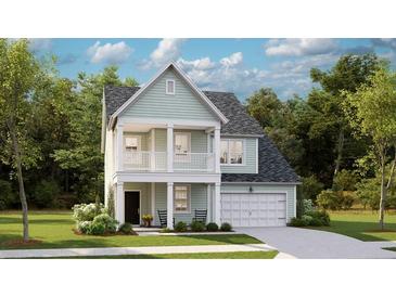 Charming two-story home with front porch, manicured lawn, attached garage, and lush surrounding trees at 1844 Nola Run, Summerville, SC 29485
