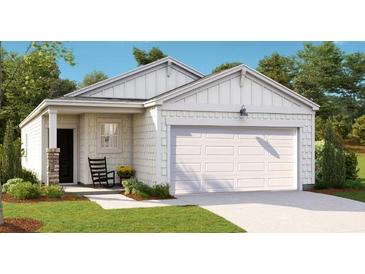 Charming single-story home with a two-car garage and inviting front porch at 301 Pine Crest View Dr, Summerville, SC 29486
