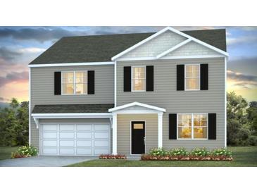 Charming two-story home featuring a garage, neutral siding and dark shutters at 321 Blue Haw Dr, Moncks Corner, SC 29461