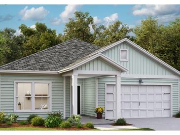 Charming single-story home with light green siding, a two car garage, and well manicured landscaping at 564 Richfield Way, Summerville, SC 29486