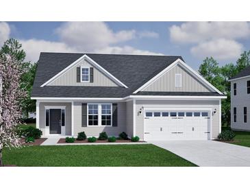 Charming single-story home with a two-car garage, manicured lawn, and a beautifully landscaped front yard at 123 Crosscut Ln, Summerville, SC 29486