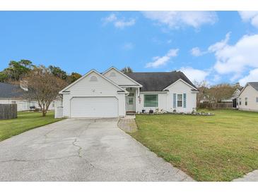 Charming one-story home with a well-manicured lawn and attached two-car garage at 103 Hazelton Ct, Goose Creek, SC 29445