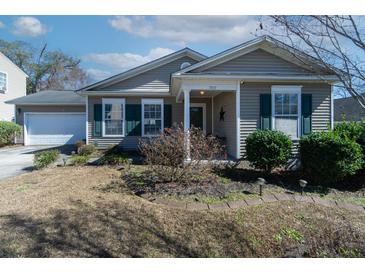 Charming single-story home with a well-manicured front yard and inviting entrance at 7919 New Ryder Rd, North Charleston, SC 29406