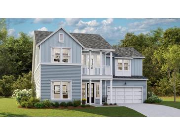 Charming two-story home with blue siding, white trim, a covered porch, and an attached garage at 360 Citrus Dr, Summerville, SC 29486