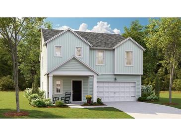 Charming two-story home with a front porch, attached garage, well-manicured lawn, and appealing curb appeal at 615 Red Monarch Way, Moncks Corner, SC 29461