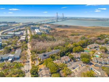 Scenic aerial view showcasing the Ravenel Bridge, nearby marshlands, and the community's layout at 274 Alexandra Dr # 14, Mount Pleasant, SC 29464
