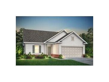 Charming single-story home showcasing classic architectural design and manicured landscaping at 148 Royal Cainhoy Way, Huger, SC 29450