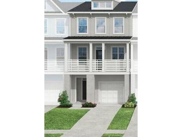 Charming two-story home with a covered front porch and an attached garage at 408 Katies Scenic Ct, Charleston, SC 29492