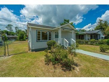 Charming single story home featuring a covered front porch and freshly cut lawn at 111 Carver St, Walterboro, SC 29488