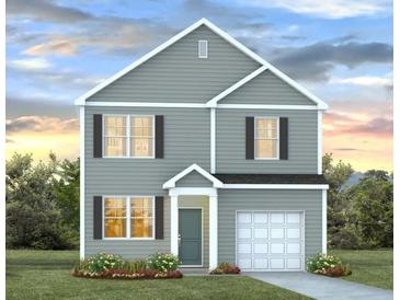 Charming two-story home with gray siding, black shutters, an attached garage, and a well-manicured front yard at 127 River Hill Rd, Goose Creek, SC 29445