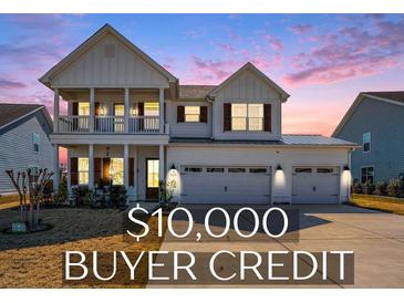 Charming two-story home featuring a welcoming porch, three-car garage, and a $10,000 buyer credit at 624 Sienna Way, Summerville, SC 29486