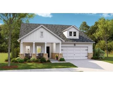 Charming single-Gathering home featuring a two-car garage and a welcoming front porch at 1006 Tulip Shell St, Summerville, SC 29485