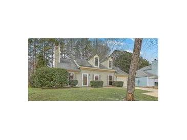Charming one-story home with landscaped yard and inviting curb appeal is move-in ready at 158 Commons Way, Goose Creek, SC 29445