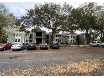 Traditional two-story condos in a neighborhood setting with ample parking and mature trees at 276 Alexandra Dr # 6, Mount Pleasant, SC 29464