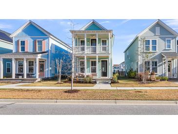 Charming two-story home featuring a double front porch in a vibrant community at 326 Ripple Park Dr, Summerville, SC 29486
