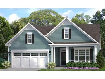 Charming one-story home with attached garage, manicured lawn and covered front porch at 170 Collared Dove Ct, Summerville, SC 29483