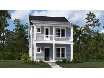 Charming two-story home with light-blue siding, white trim, and a welcoming front porch at 295 Citrus Dr, Summerville, SC 29486