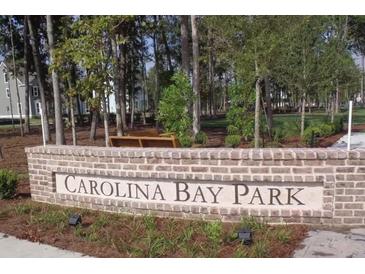 Brick sign at Carolina Bay Park surrounded by trees at 4004 Flatiron Dr, Charleston, SC 29414