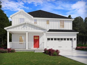 Charming two-story home featuring a bright red front door, a covered porch, and an attached two-car garage at 331 Calm Water Way, Summerville, SC 29486