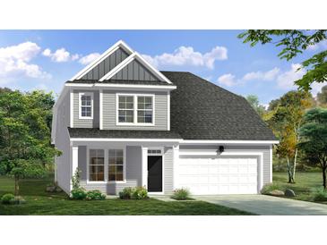 Charming two-story home with gray siding, a gabled roof, and a two-car garage at 468 Cadbury Loop, Summerville, SC 29486