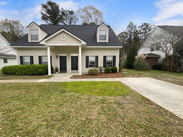 Charming townhome featuring a well-maintained lawn and a classic design at 3048 Queensgate Way, Mount Pleasant, SC 29466
